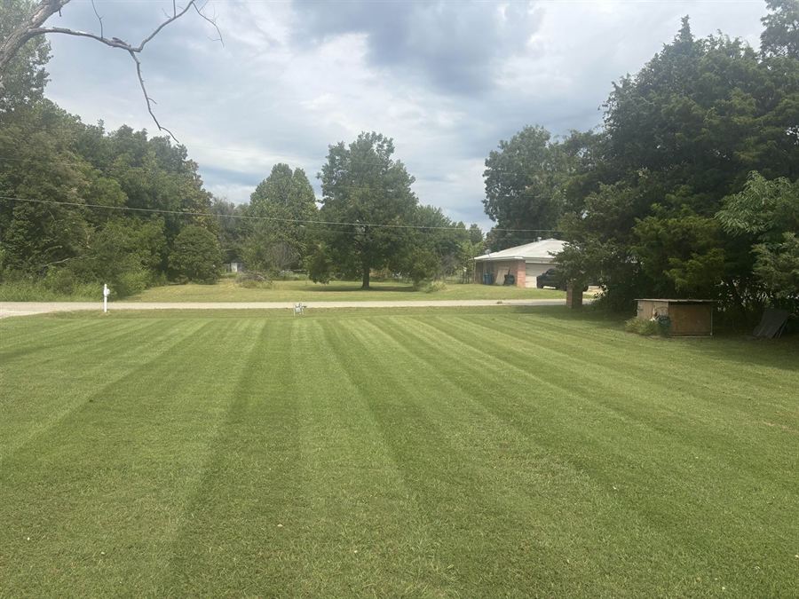 Large lawn mowed in clean, even stripes